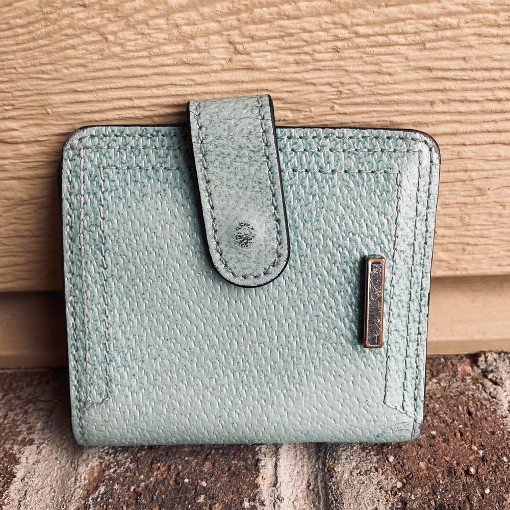 Lodi’s light green mini wallet.